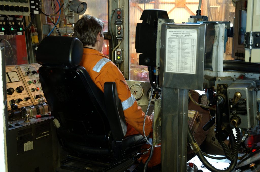Man Operating Machine From Cab 20000x1325 Shutterstock 705629